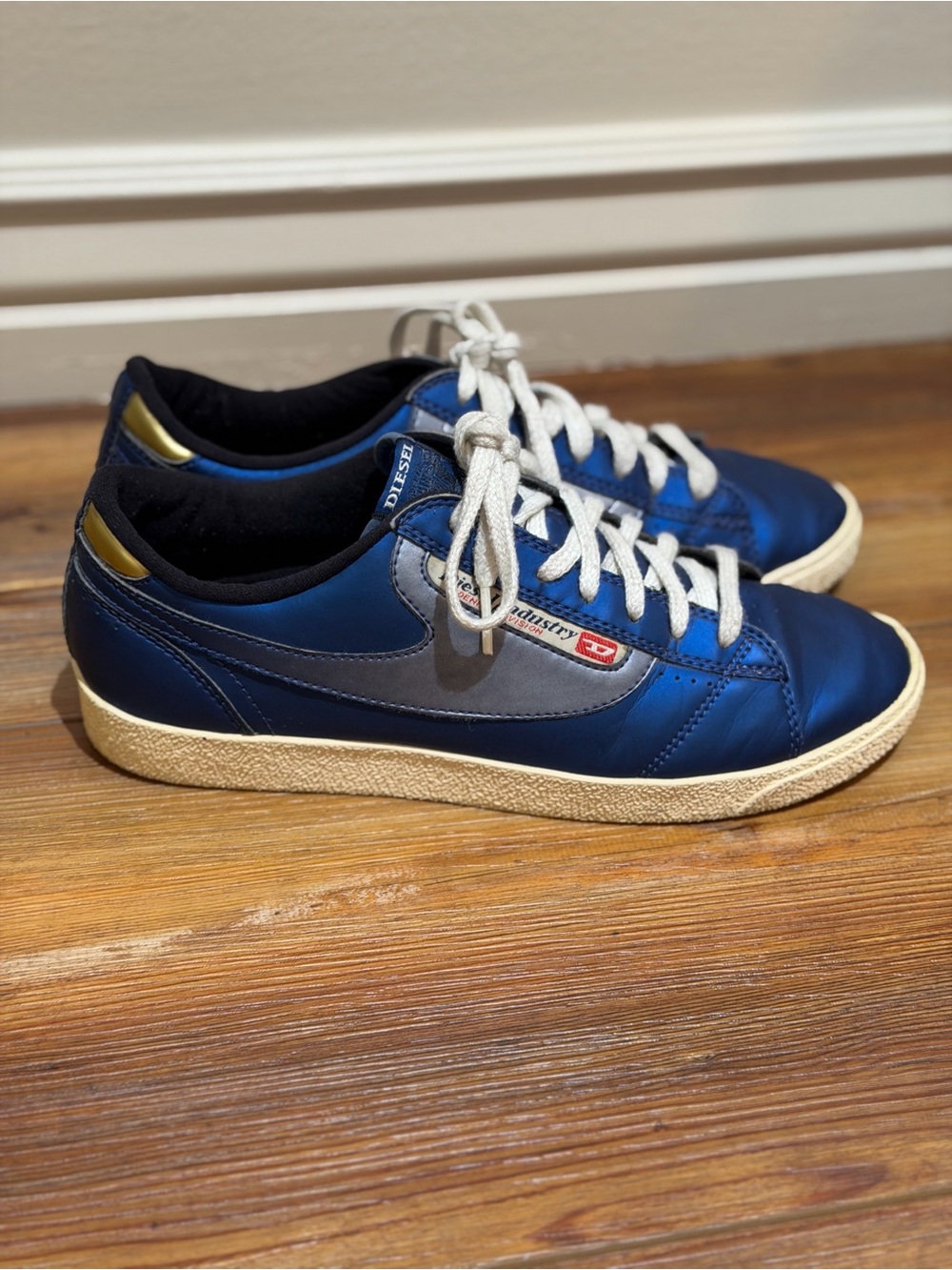 vintage Diesel "Eagle" Low-Top Sneakers in the Mazarine Blue/Silver Size 7.5